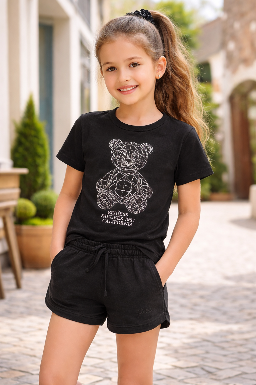 T-shirt Guess bambina con orsetto strass nera 8-16 anni